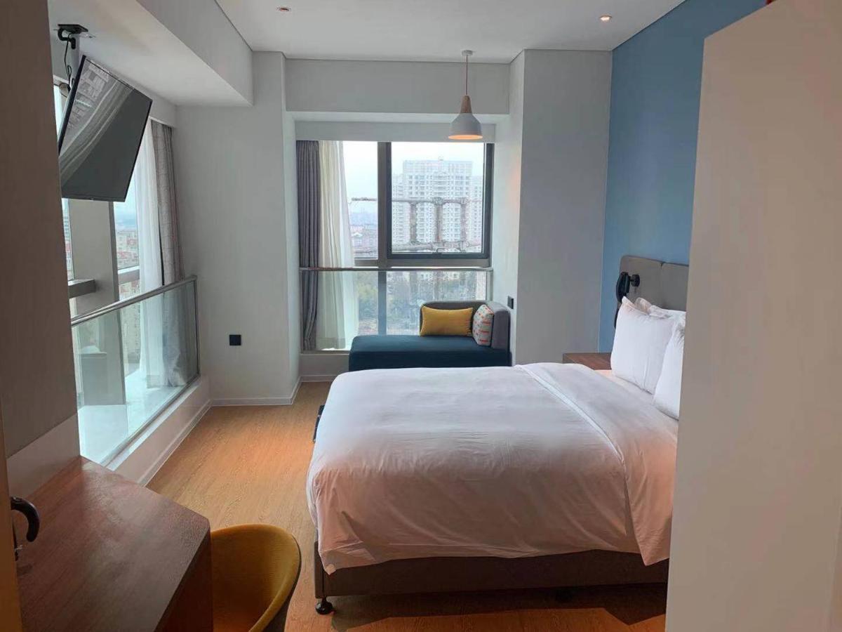 Holiday Inn Express Shanghai Baoyang By Ihg Esterno foto