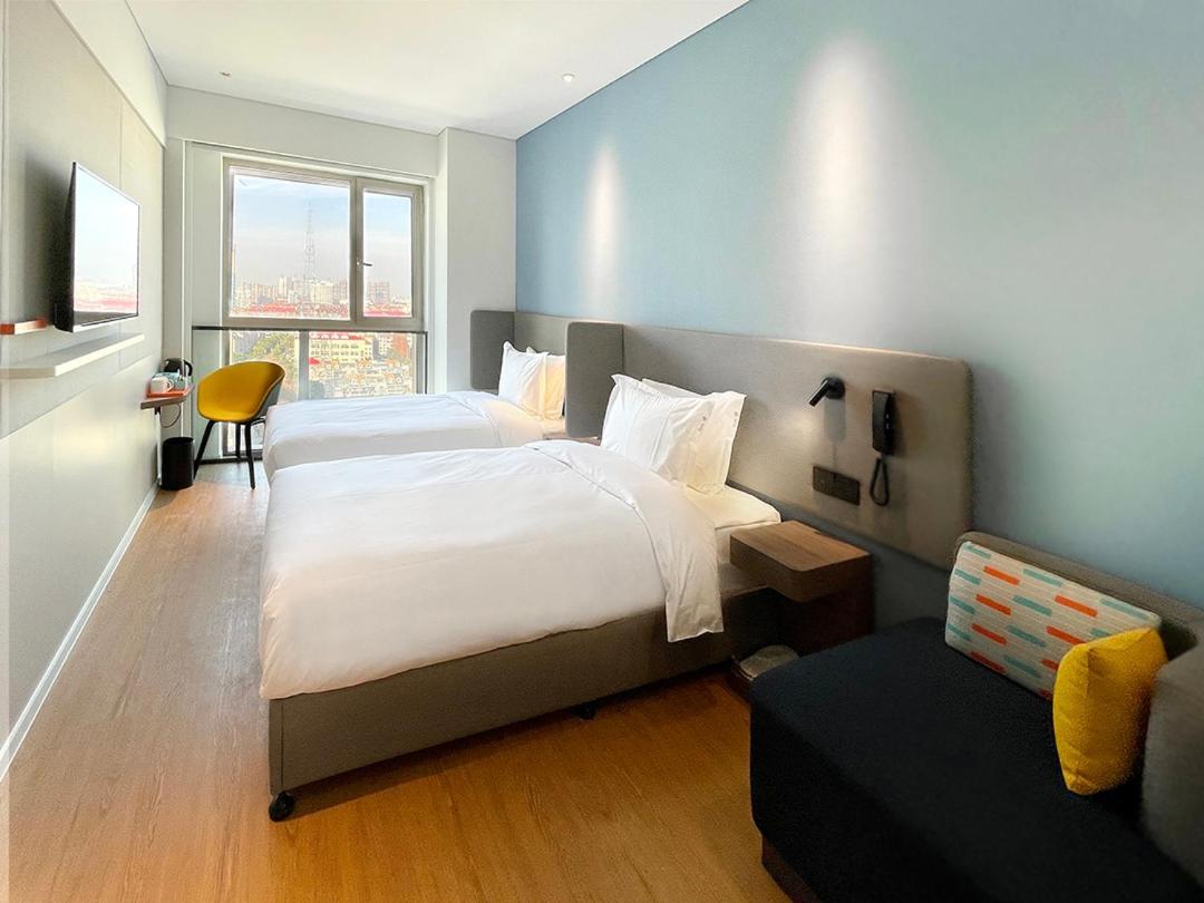 Holiday Inn Express Shanghai Baoyang By Ihg Esterno foto